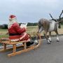 XXL Rentier mit Schlitten und Weihnachtsmann mit Buch 350 cm